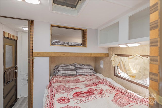 bedroom featuring hardwood / wood-style floors