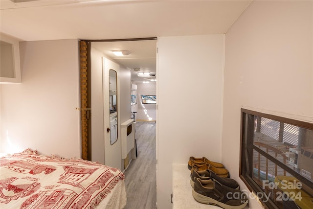 bedroom featuring wood-type flooring