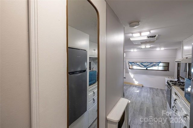 bathroom featuring wood-type flooring