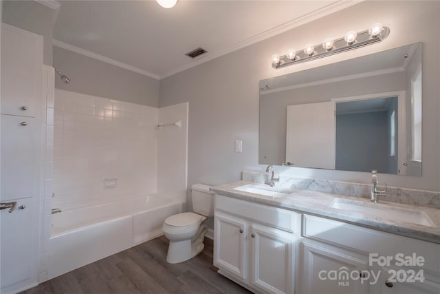 full bathroom featuring shower / bath combination, vanity, hardwood / wood-style floors, and crown molding