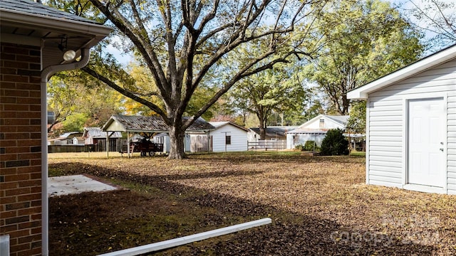 view of yard with a shed