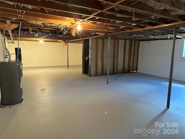 basement featuring water heater