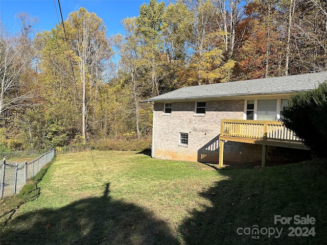 view of yard with a deck