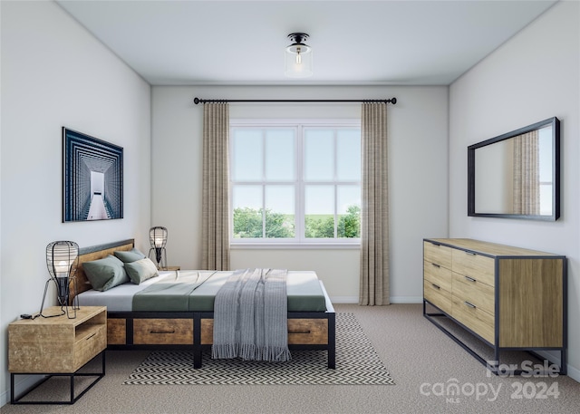 bedroom featuring light colored carpet