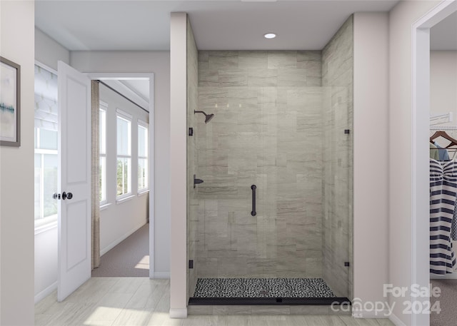 bathroom with an enclosed shower