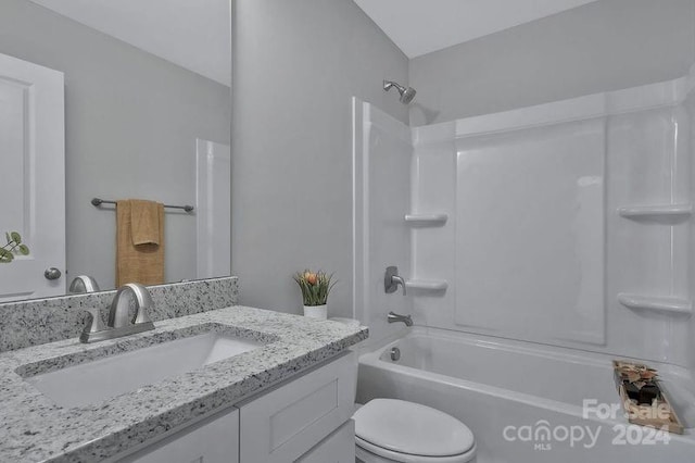 full bathroom featuring vanity, toilet, and shower / washtub combination