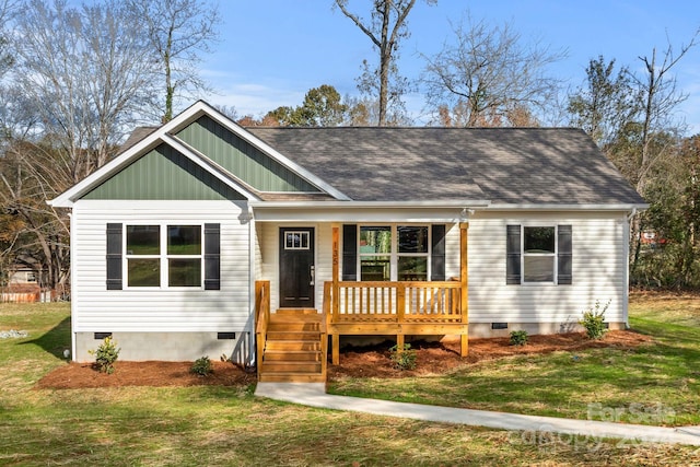 view of front facade with a porch and a front yard