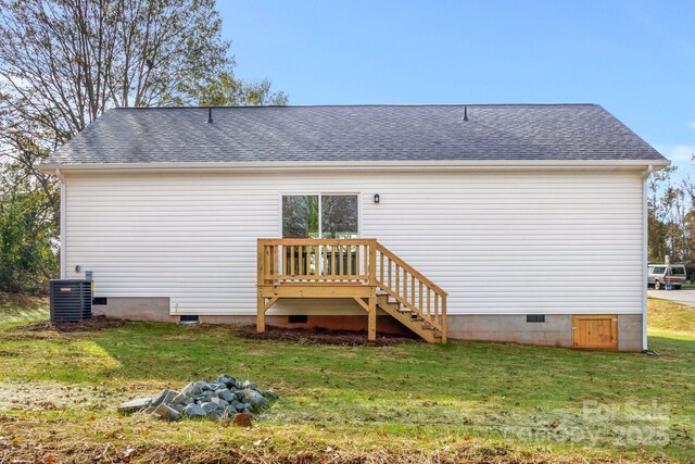 135 Orchard St, Forest City, NC 28043 - back of house with a lawn, roof with shingles, crawl space, and cooling unit