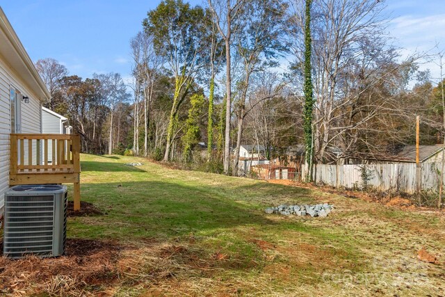 135 Orchard St, Forest City, NC 28043 - view of yard with central air condition unit and fence