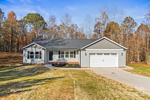 single story home featuring a garage and a front yard