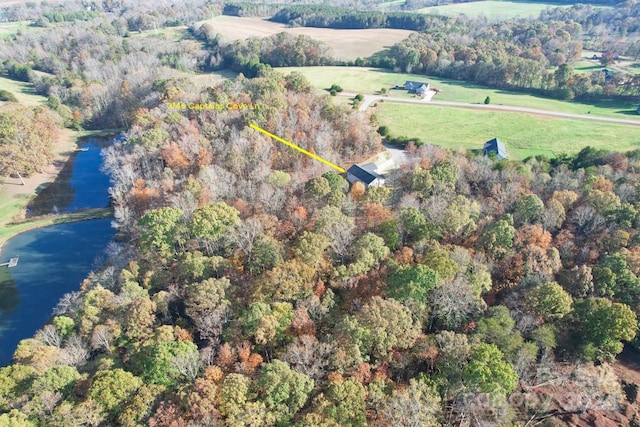 aerial view featuring a water view and a rural view