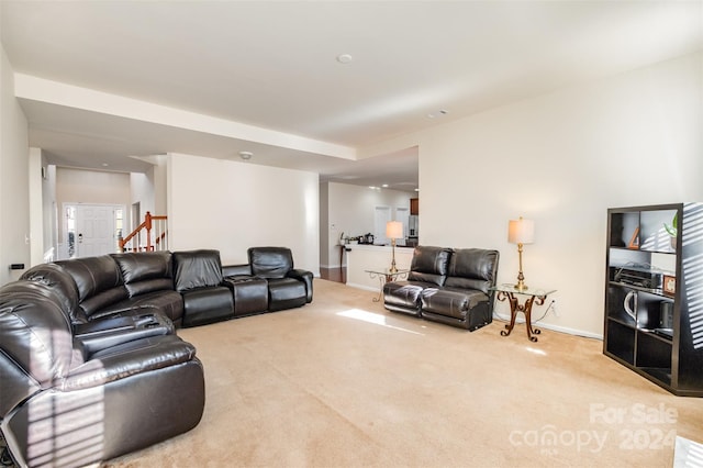 living room featuring light carpet