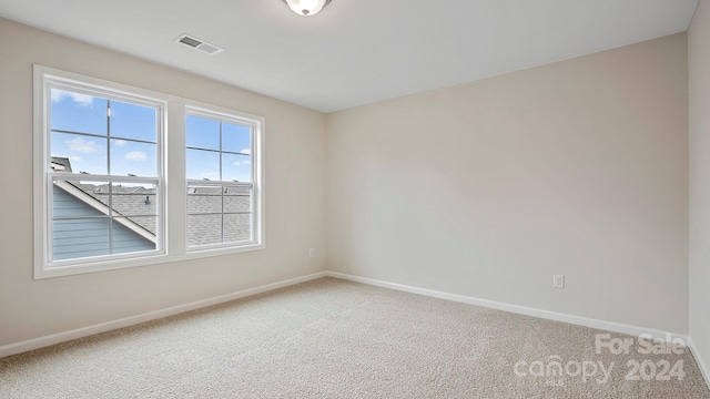 view of carpeted spare room