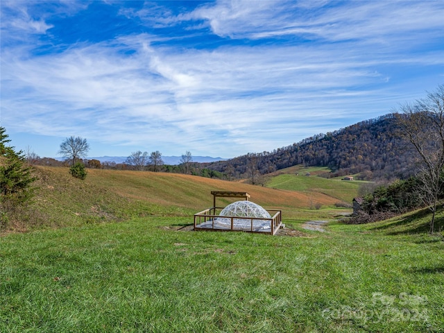 mountain view with a rural view