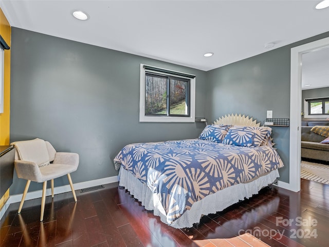 bedroom featuring dark hardwood / wood-style floors