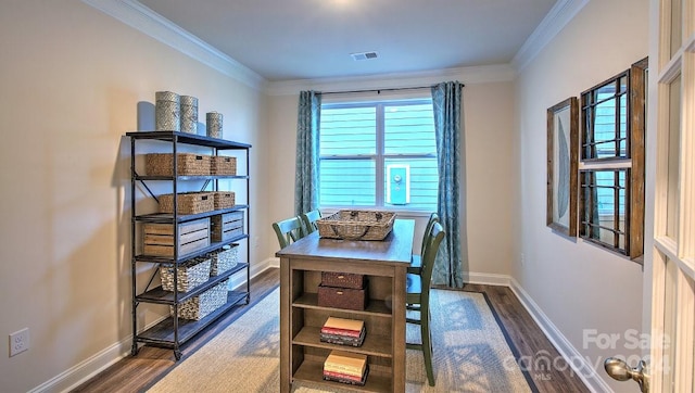 home office with dark hardwood / wood-style floors and crown molding