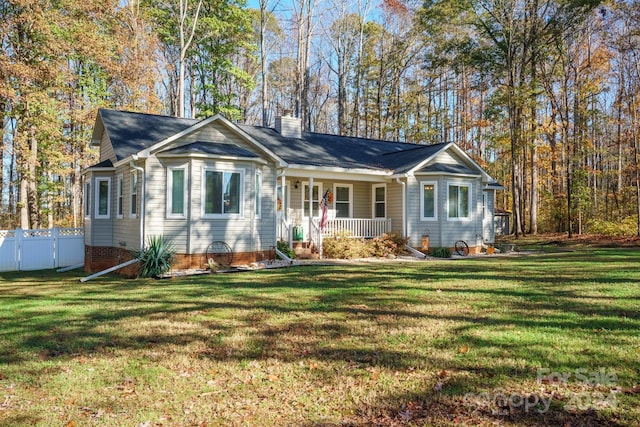 single story home with covered porch and a front lawn