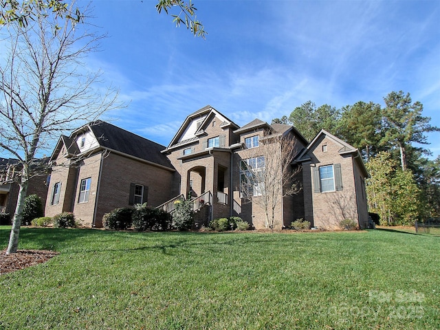 view of front facade with a front lawn