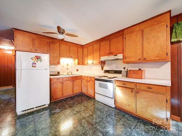 kitchen featuring ceiling fan, sink, and white appliances