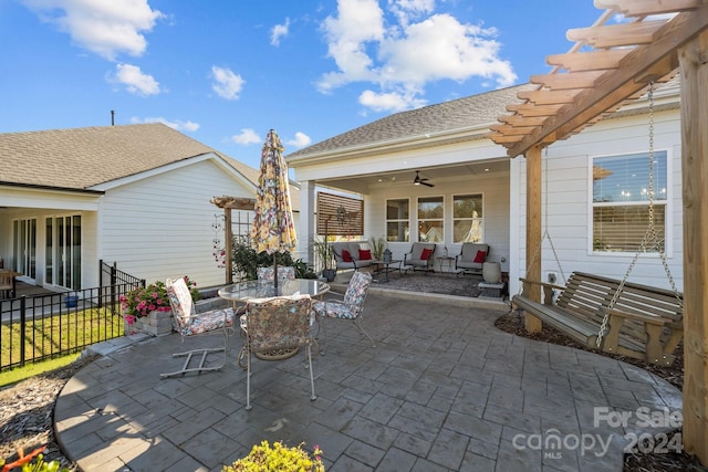 view of patio / terrace featuring a pergola, ceiling fan, and an outdoor living space