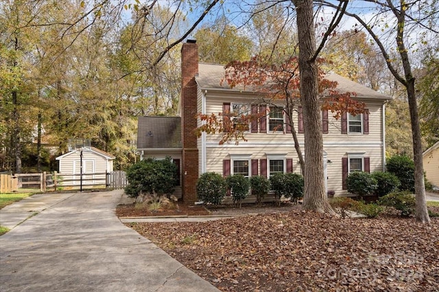 colonial home with a garage