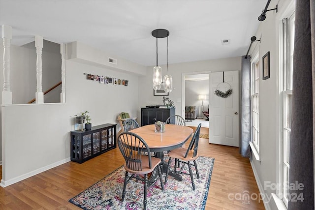 dining room with light hardwood / wood-style floors