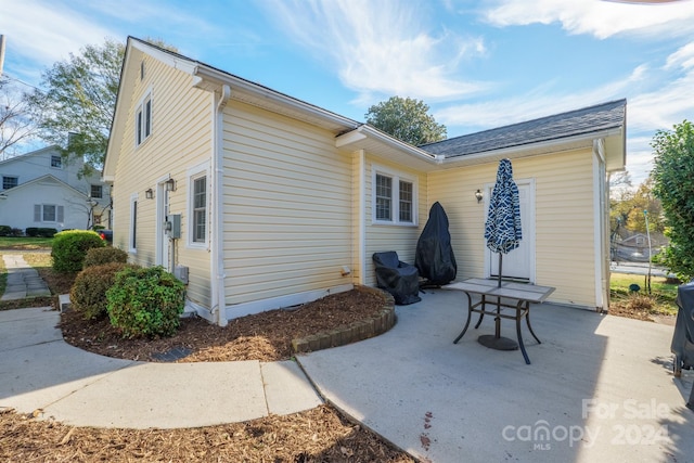 rear view of house featuring a patio