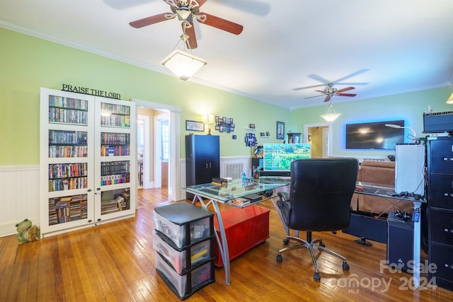 office area with wood-type flooring, ceiling fan, and crown molding