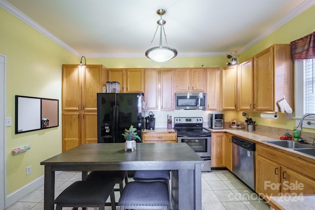 kitchen with appliances with stainless steel finishes, crown molding, sink, light tile patterned floors, and decorative light fixtures