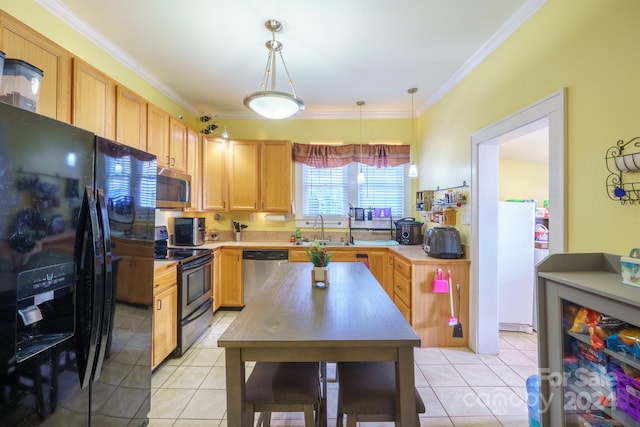 kitchen with sink, decorative light fixtures, light tile patterned flooring, black appliances, and ornamental molding