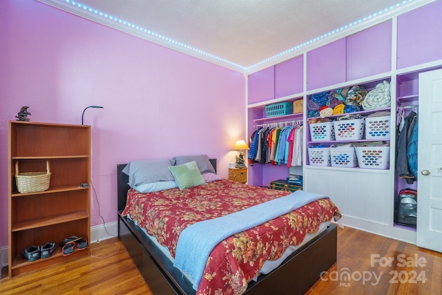 402 W 7th St, Newton, NC 28658 - bedroom with wood finished floors and baseboards