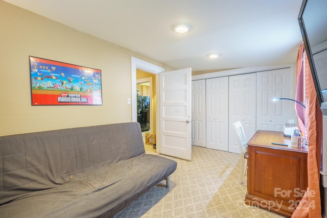 sitting room with light colored carpet