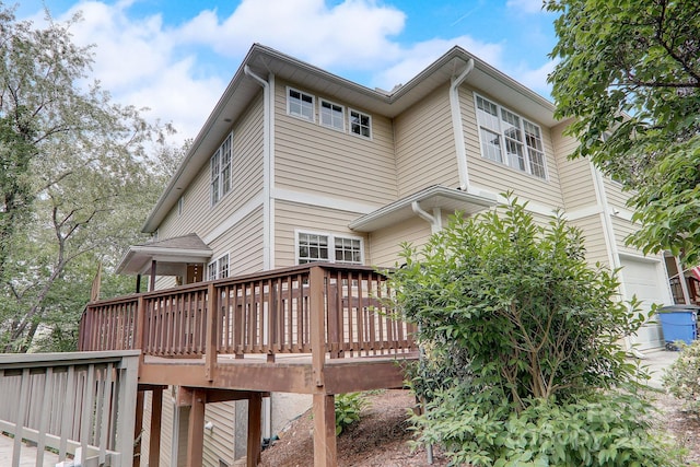 rear view of property with a deck