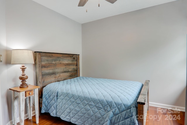 bedroom featuring wood-type flooring and ceiling fan