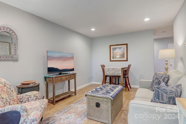 living room with light hardwood / wood-style floors