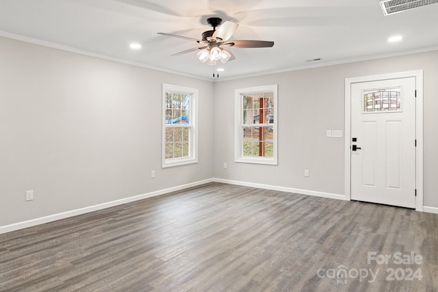 interior space featuring ornamental molding, hardwood / wood-style floors, and ceiling fan