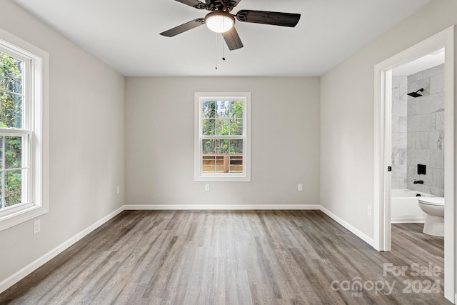 interior space with hardwood / wood-style flooring and ceiling fan