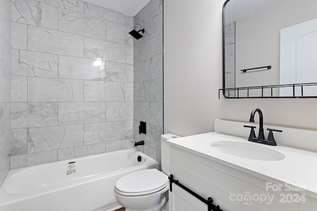 full bathroom featuring toilet, vanity, and tiled shower / bath