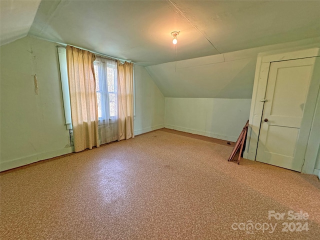 bonus room featuring lofted ceiling