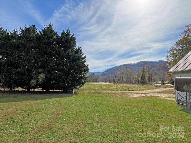 property view of mountains with a rural view