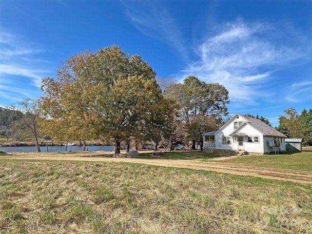 view of yard with a water view