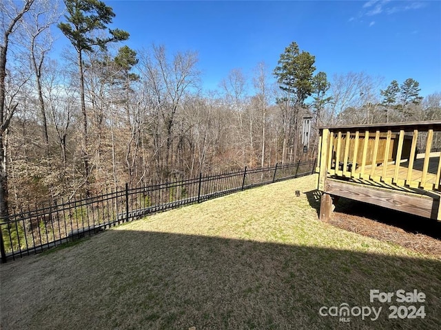 view of yard with a deck