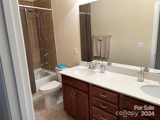 full bathroom with shower / bathtub combination with curtain, tile patterned flooring, vanity, and toilet