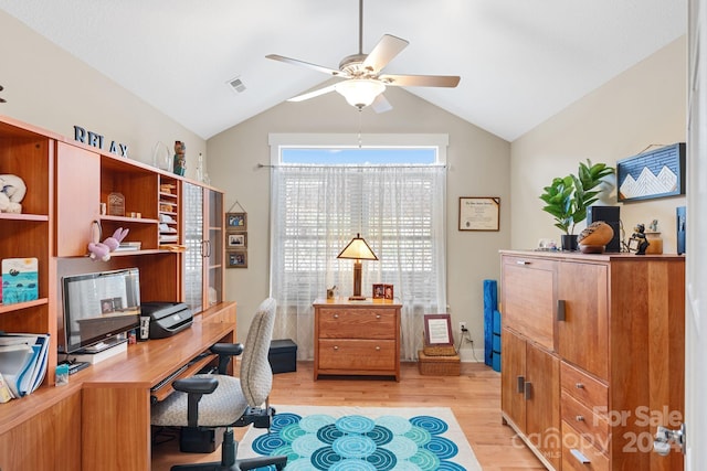 office space with light hardwood / wood-style floors, ceiling fan, and lofted ceiling