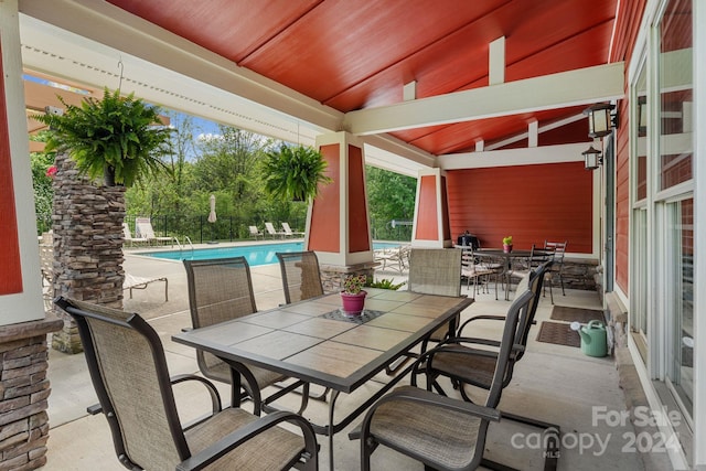 15 Westfield Way, Candler, NC 28715 - view of patio with outdoor dining area and a community pool