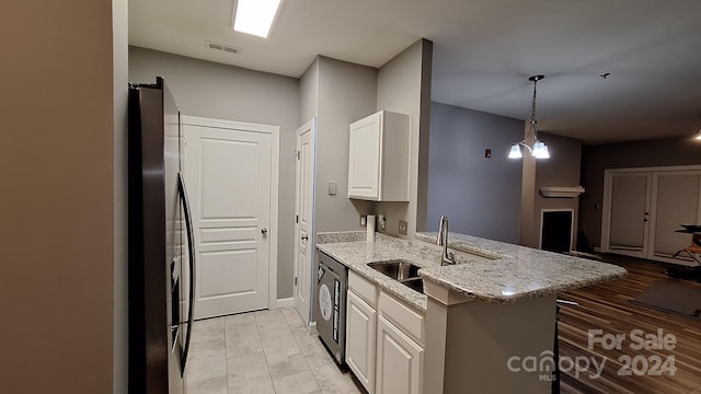 kitchen featuring kitchen peninsula, white cabinetry, sink, and stainless steel refrigerator with ice dispenser