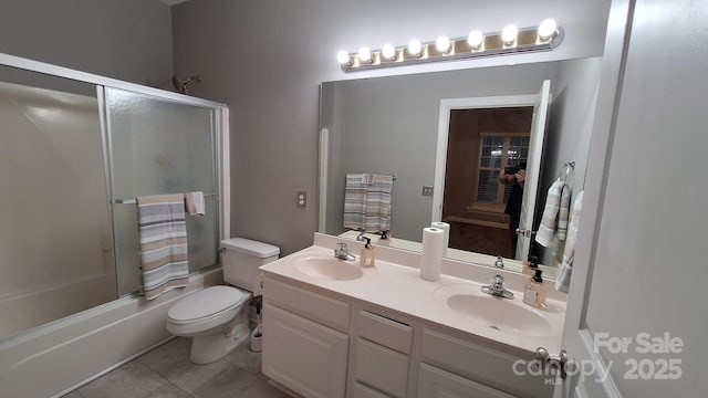 full bathroom with vanity, tile patterned flooring, tub / shower combination, and toilet