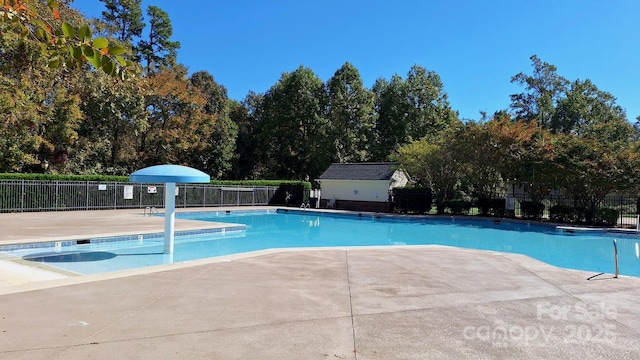 view of pool featuring a patio area