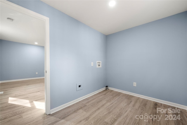 spare room featuring light hardwood / wood-style floors