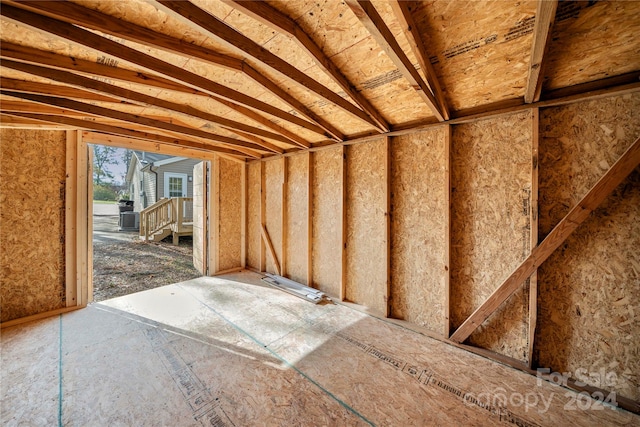 miscellaneous room featuring lofted ceiling